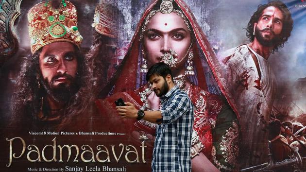 A cinemagoer takes a selfie in front of a poster of Bollywood movie Padmaavat outside a movie theatre in Kochi. (Reuters File Photo) A cinemagoer takes a selfie in front of a poster of Bollywood movie Padmaavat outside a movie theatre in Kochi. (Reuters File Photo)