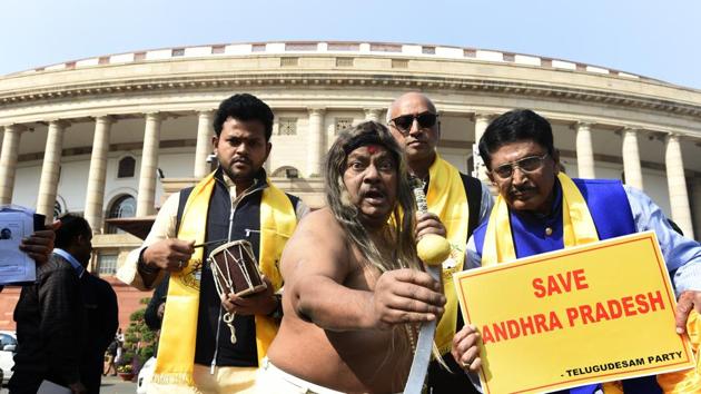Telugu Desam Party (TDP ) MP from Chittoor, N Sivaprasad( C) along with other members from Andhra Pradesh protested demanding special package for the state, during the budget session of Parliament in New Delhi. (Arvind Yadav / HT Photo) Telugu Desam Party (TDP ) MP from Chittoor, N Sivaprasad( C) along with other members from Andhra Pradesh protested demanding special package for the state, during the budget session of Parliament in New Delhi. (Arvind Yadav / HT Photo)