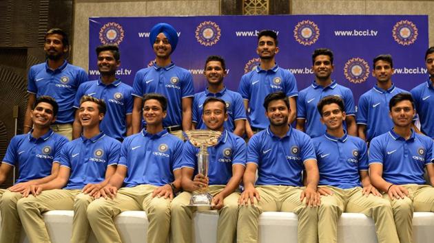 India's U19 cricket team members pose with the trophy during a news conference in Mumbai on February 5, 2018. India won the U19 cricket World Cup in New Zealand. (Punit Paranjpe / AFP) India's U19 cricket team members pose with the trophy during a news conference in Mumbai on February 5, 2018. India won the U19 cricket World Cup in New Zealand. (Punit Paranjpe / AFP)