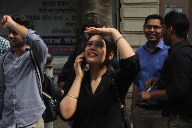 People watch share prices on a digital broadcast outside the Bombay Stock Exchange (BSE), in Mumbai, India. (Bhushan Koyande/HT) People watch share prices on a digital broadcast outside the Bombay Stock Exchange (BSE), in Mumbai, India. (Bhushan Koyande/HT)