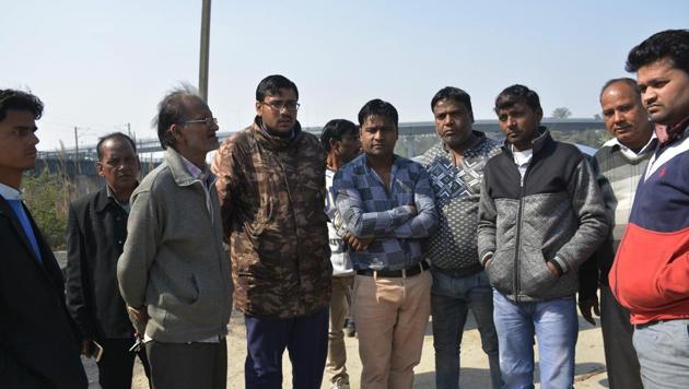 Relatives of the victim wait for his body to be handed over. (Sakib Ali/HT Photo) Relatives of the victim wait for his body to be handed over. (Sakib Ali/HT Photo)