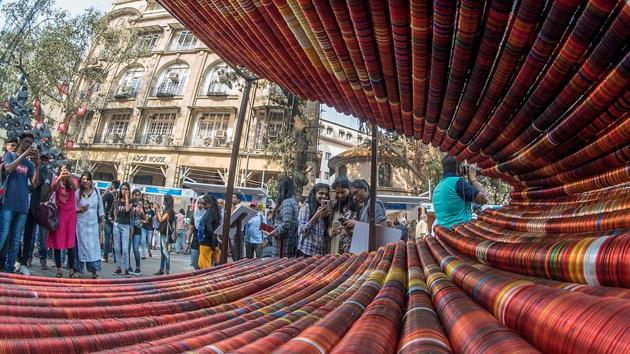 ‘Rawness Is Richness’ by artist Ruchi Sheth was a V-shaped geometric structure created using glass bangles. At some angles, it looked like the portrait of a woman. The artist used 40,000 bangles to create the structure. (Pratik Chorge / HT Photo) 