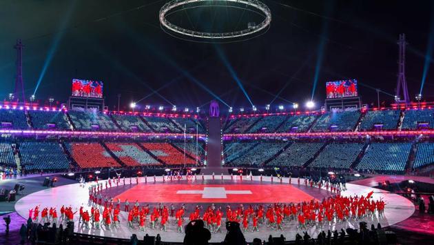 The Switzerland delegation parades during the opening ceremony. (AFP) The Switzerland delegation parades during the opening ceremony. (AFP)
