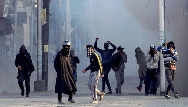 Protesters throw stones at security forces during a demonstration against the killing of three civilians allegedly in Army firing in Shopian district on January 27. (PTI File Photo) Protesters throw stones at security forces during a demonstration against the killing of three civilians allegedly in Army firing in Shopian district on January 27. (PTI File Photo)