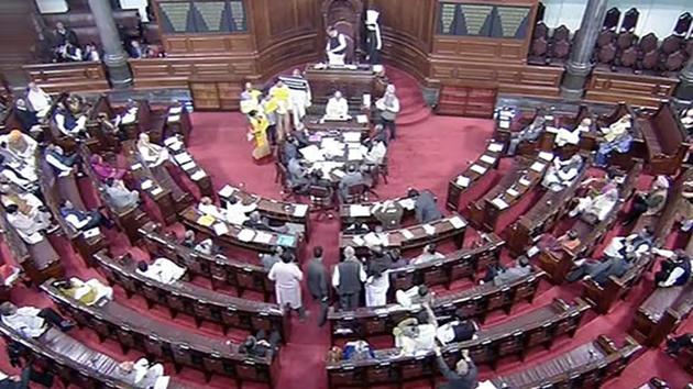 TDP members protest in the well of the Rajya Sabha, in New Delhi on Friday. PTI Photo / TV GRAB (PTI Photo) TDP members protest in the well of the Rajya Sabha, in New Delhi on Friday. PTI Photo / TV GRAB (PTI Photo)
