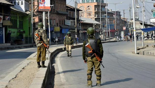 Security personnel patrol a street during restrictions in Srinagar . (PTI file photo) Security personnel patrol a street during restrictions in Srinagar . (PTI file photo)