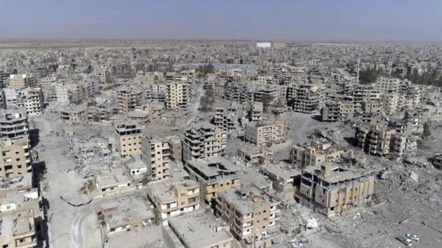 This Oct 19, 2017, image from drone video, shows damaged buildings in Raqqa, Syria, two days after Syrian Democratic Forces said military operations to oust the Islamic State group ended. (AP Photo) This Oct 19, 2017, image from drone video, shows damaged buildings in Raqqa, Syria, two days after Syrian Democratic Forces said military operations to oust the Islamic State group ended. (AP Photo)