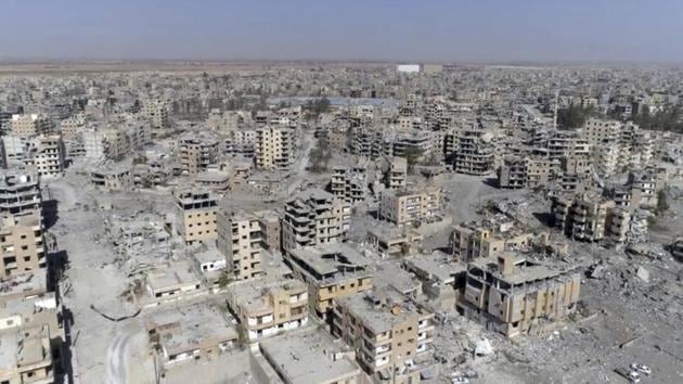 This October 19, 2017, image from drone video shows damaged buildings in Raqqa, Syria, two days after Syrian Democratic Forces said military operations to oust the Islamic State group ended. (AP File Photo) This October 19, 2017, image from drone video shows damaged buildings in Raqqa, Syria, two days after Syrian Democratic Forces said military operations to oust the Islamic State group ended. (AP File Photo)