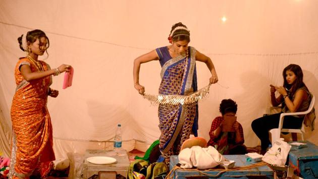 Artists get ready for a performance during Dholki fad and Tamasha Festival organised by Cultural Ministry near CIDCO Exhibition Center Vashi, Navi Mumbai on February 8, 2018. (Bachchan Kumar / HT Photo) Artists get ready for a performance during Dholki fad and Tamasha Festival organised by Cultural Ministry near CIDCO Exhibition Center Vashi, Navi Mumbai on February 8, 2018. (Bachchan Kumar / HT Photo)