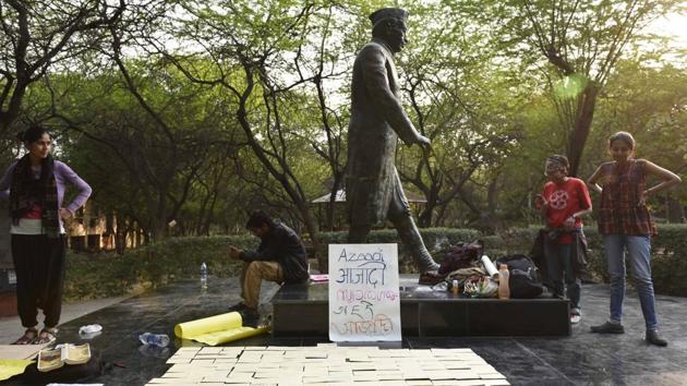 Protests, demonstrations, slogans and wall graffiti against administration have existed in JNU since its inception. The university recently made 75% attendance compulsory for all students, leading to students and teachers boycotting attendance sheets. Nivedita Menon, a professor, pointed out that students are attending the classes but refusing to sign the attendance sheet. “So we all go to the class but refuse to be controlled,” she said. (Vipin Kumar / HT Archive)