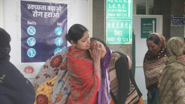 Pranjal Sharma’s family at the district hospital, Noida, on Friday. (HT Photo) Pranjal Sharma’s family at the district hospital, Noida, on Friday. (HT Photo)