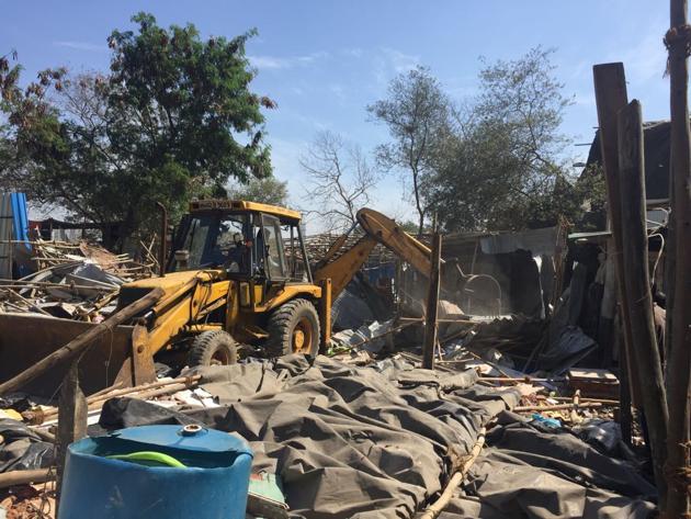 The district administration started a series of demolition drives at a 10-acre mangrove patch near Yari Road in Versova on Friday.(HT file photo)