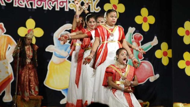 A group of differently-abled students align themselves in a formation representing a fierce goddess during the Kamayani school’s annual gathering at the Tilak Smarak Mandir on February 7. (Rahul Raut/HT PHOTO)