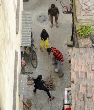 KOLKATA: There seems to even be a gully version of football in Kolkata, where kids play the open-field game in a narrow alley, as here in the residential area of College Street. (Samir Jana / HT PHOTO)