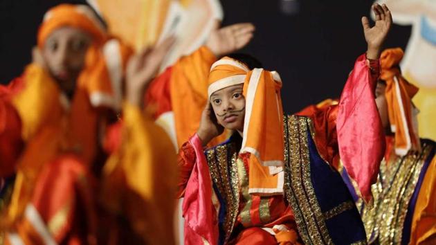 A group of differently-abled students from Kamayani school perform a Punjabi dance at the school’s annual gathering at the Tilak Smarak Mandir on February 7. (Rahul Raut/HT PHOTO)