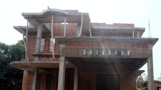 A half-built house of an expatriate in Saudi Arabia awaits completion at Kozhikkode in north Kerala (HT Photo) A half-built house of an expatriate in Saudi Arabia awaits completion at Kozhikkode in north Kerala (HT Photo)