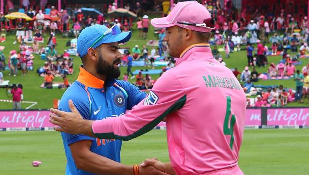 Skippers Virat Kohli (L) and Aiden Markram of at the toss before the 4th ODI between South Africa and India at the Wanderers Cricket Ground in Johannesburg, South Africa on February 10, 2018. This game is the annual ‘Pink ODI’. (BCCI / SPORTZPICS)