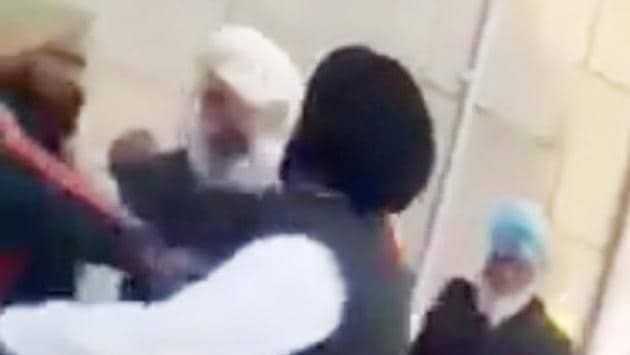 A CCTV footage of Congress leader Nishan Singh Rani Walah slapping a man at Sarhali village in Amritsar on Friday. (Sameer Sehgal/HT) A CCTV footage of Congress leader Nishan Singh Rani Walah slapping a man at Sarhali village in Amritsar on Friday. (Sameer Sehgal/HT)