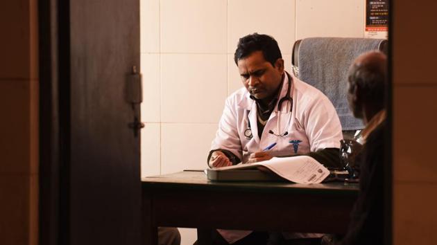 Dr. Sunil Rathore, medical officer of the Community Health Centre Clinic (CHC) at Bangarmau in Unnao. There are only six doctors against the sanctioned strength of 12 here, and none of them are specialists. Quacks, who offer treatment for as little as Rs 5 and Rs 10 along with medicines, were the lifeline for Premgunj residents who rarely go to the CHC.  (Sanchit Khanna / HT Photo) 