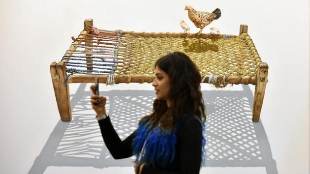 A super realist art piece by the artist Anjaneyulu G is pictured behind a visitor. Not restricted to Indian artists, the art fair is considered as a major platform for artists coming from neighbouring countries like Nepal and Bangladesh as well. (Raj K Raj / HT Photo) A super realist art piece by the artist Anjaneyulu G is pictured behind a visitor. Not restricted to Indian artists, the art fair is considered as a major platform for artists coming from neighbouring countries like Nepal and Bangladesh as well. (Raj K Raj / HT Photo)