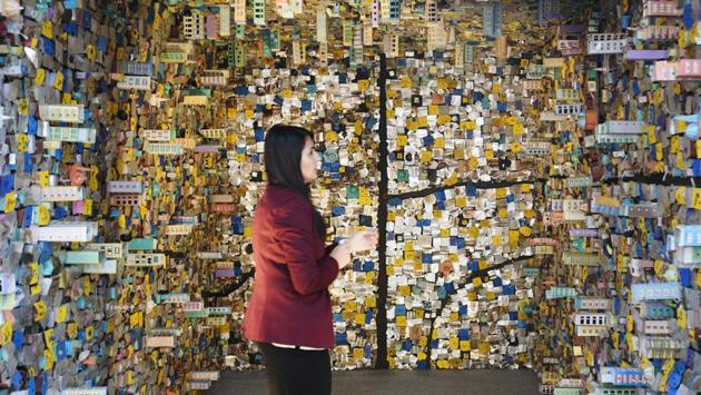 A visitor looks at an immersive piece by Hema Upadhyay. The art fair this year will see a larger participation of non-profit and public institutions compared to the previous years. The India Art Fair is open till February 12, 2018. (Raj K Raj / HT Photo) A visitor looks at an immersive piece by Hema Upadhyay. The art fair this year will see a larger participation of non-profit and public institutions compared to the previous years. The India Art Fair is open till February 12, 2018. (Raj K Raj / HT Photo)