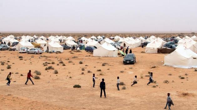 Displaced people from the Libyan town of Tawergha, 260 km east of the Libyan capital Tripoli, are seen on February 8, 2018 at a temporary camp, 20 kms from Tawergha, after they were denied entry to their hometown. (AFP Photo) Displaced people from the Libyan town of Tawergha, 260 km east of the Libyan capital Tripoli, are seen on February 8, 2018 at a temporary camp, 20 kms from Tawergha, after they were denied entry to their hometown. (AFP Photo)