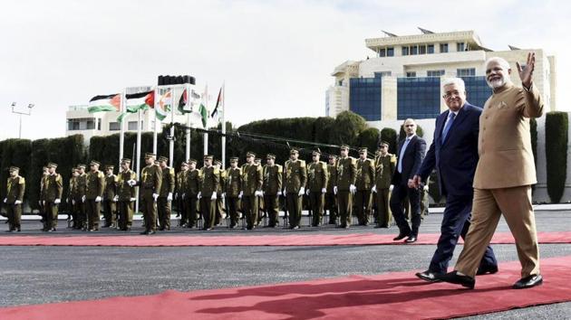 Prime Minister Narendra Modi and Palestinian President Mahmoud Abbas inspect a ceremonial guard of honour at Al-Muqata'a, the compound of the presidential headquarters in Ramallah on February 10, 2018. PM Modi on Saturday arrived in Ramallah, making him the first-ever Indian prime minister to visit Palestine. Modi, who is on a four-nation regional trip, was in Jordan on Friday. (PTI) Prime Minister Narendra Modi and Palestinian President Mahmoud Abbas inspect a ceremonial guard of honour at Al-Muqata'a, the compound of the presidential headquarters in Ramallah on February 10, 2018. PM Modi on Saturday arrived in Ramallah, making him the first-ever Indian prime minister to visit Palestine. Modi, who is on a four-nation regional trip, was in Jordan on Friday. (PTI)