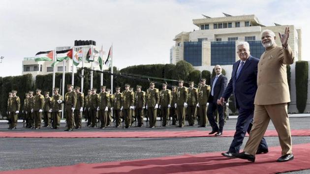 Prime Minister Narendra Modi and Palestinian President Mahmoud Abbas are accorded a ceremonial guard of honour at Al-Muqata’a, compound of the presidential headquarters in Ramallah, on Saturday. (PTI Photo) Prime Minister Narendra Modi and Palestinian President Mahmoud Abbas are accorded a ceremonial guard of honour at Al-Muqata’a, compound of the presidential headquarters in Ramallah, on Saturday. (PTI Photo)