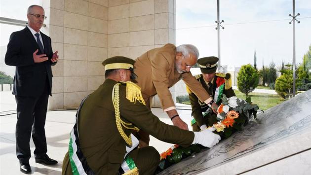 Upon his arrival Modi laid a wreath at the Mausoleum of Late President Yasser Arafat in Ramallah on Saturday, with Palestinian Prime Minister Rami Hamdallah (L) accompanying him. (PTI) Upon his arrival Modi laid a wreath at the Mausoleum of Late President Yasser Arafat in Ramallah on Saturday, with Palestinian Prime Minister Rami Hamdallah (L) accompanying him. (PTI)