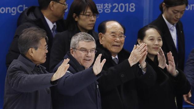 South Korean President Moon Jae-in, IOC president Thomas Bach, North Korea's nominal head of state Kim Yong Nam and Kim Yo Jong, sister of North Korean leader Kim Jong Un, greet players after the preliminary round of the women's hockey game between Switzerland and the combined Koreas at the 2018 Winter Olympics in Gangneung, South Korea, Saturday, Feb. 10, 2018. ( (AP) South Korean President Moon Jae-in, IOC president Thomas Bach, North Korea's nominal head of state Kim Yong Nam and Kim Yo Jong, sister of North Korean leader Kim Jong Un, greet players after the preliminary round of the women's hockey game between Switzerland and the combined Koreas at the 2018 Winter Olympics in Gangneung, South Korea, Saturday, Feb. 10, 2018. ( (AP)