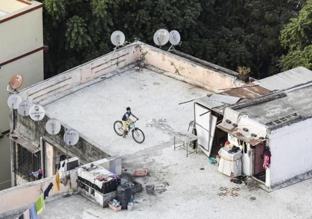 MUMBAI: “Kids aren’t allowed to play in the compound; it’s reserved for parking,” says Ashwini Dandwate, 40, who lives with daughters aged 14 and 7 in metropolitan Mumbai. “There is a podium area, but it’s tiled, so they could slip and hurt themselves there. They end up either cycling or watching YouTube. Sometimes they play with their friends in the lobby.” (Kunal Patil / HT Photo)