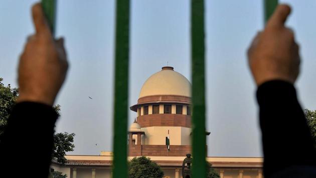 A view of Supreme Court of India in New Delhi. (PTI File Photo) A view of Supreme Court of India in New Delhi. (PTI File Photo)