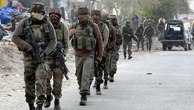 Security personnel take positions during a militants attack at Sunjwan Army camp in Jammu on Saturday.(PTI) Security personnel take positions during a militants attack at Sunjwan Army camp in Jammu on Saturday.(PTI)