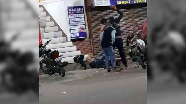 Grabs from a video clipping show the murderous assault on the youth near a restaurant in Katra area of Allahabad on Saturday.