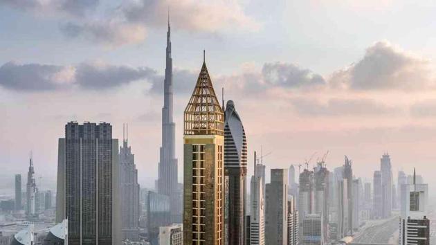 The gleaming gold 75-storey Gevora Hotel stands 356 metres, or nearly a quarter of a mile, tall. (Twitter/Dubai Media Office) The gleaming gold 75-storey Gevora Hotel stands 356 metres, or nearly a quarter of a mile, tall. (Twitter/Dubai Media Office)