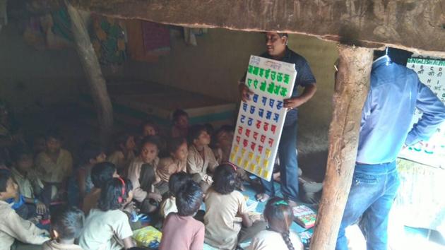 A treacher teaches with the help of new teaching aids.(HT Photo)