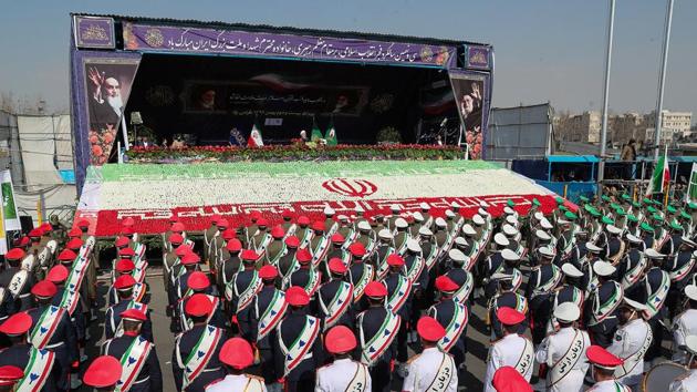Iranian President Hassan Rouhani gestures as members of Iranian armed forces take part in a rally marking the anniversary of Iran's 1979 Islamic revolution, in Tehran, Iran, February 11, 2018. (REUTERS) Iranian President Hassan Rouhani gestures as members of Iranian armed forces take part in a rally marking the anniversary of Iran's 1979 Islamic revolution, in Tehran, Iran, February 11, 2018. (REUTERS)
