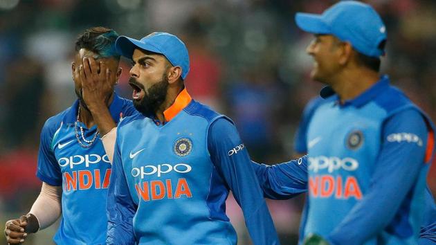 Virat Kohli (C) reacts during the 4th ODI between India and South Africa in Johannesburg on Saturday.(AFP)