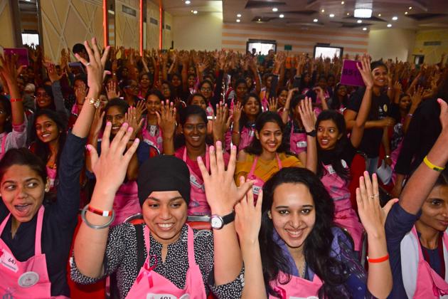 Women show their painted nails as they attempt a Guinness world record at Deccan College. (Shankar Narayan/HT PHOTO) Women show their painted nails as they attempt a Guinness world record at Deccan College. (Shankar Narayan/HT PHOTO)