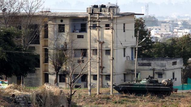 Soldiers take positions outside the residential quarters on the second day of a militant attack at Sunjwan Army camp in Jammu February 11. (AFP Photo) Soldiers take positions outside the residential quarters on the second day of a militant attack at Sunjwan Army camp in Jammu February 11. (AFP Photo)