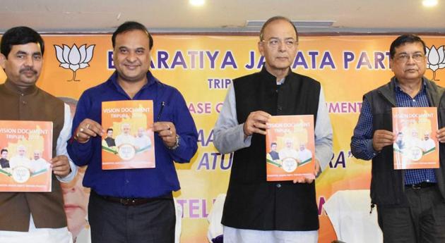 Union finance minister Arun Jaitley along with party leaders Shahnawaz Hussain and Himanta Biswa Sarma releasing the BJP’s vision document for the assembly polls in Agartala on Sunday. (PTI) Union finance minister Arun Jaitley along with party leaders Shahnawaz Hussain and Himanta Biswa Sarma releasing the BJP’s vision document for the assembly polls in Agartala on Sunday. (PTI)