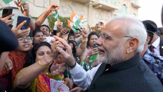 Prime Minister Narendra Modi meets the Indian community in Muscat, Oman, on Sunday. (PTI Photo) Prime Minister Narendra Modi meets the Indian community in Muscat, Oman, on Sunday. (PTI Photo)