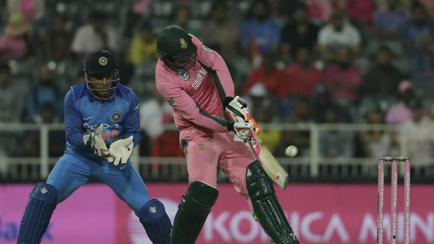 South Africa's batsman Heinrich Klaasen, right, plays a shot as India's wicketkeeper MS Dhoni, watches during the fourth One-Day International cricket match between South Africa and India at the Wanderers stadium in Johannesburg on Saturday.(AP)