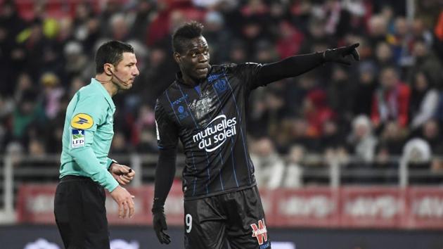 Nice's Italian forward Mario Balotelli (R) talks with French referee Nicolas Rainville (L) during the French L1 football match between Dijon (DFCO) and Nice (OGCN) on February 10, 2018, at the Gaston Gerard Stadium in Dijon, central France. (AFP) Nice's Italian forward Mario Balotelli (R) talks with French referee Nicolas Rainville (L) during the French L1 football match between Dijon (DFCO) and Nice (OGCN) on February 10, 2018, at the Gaston Gerard Stadium in Dijon, central France. (AFP)