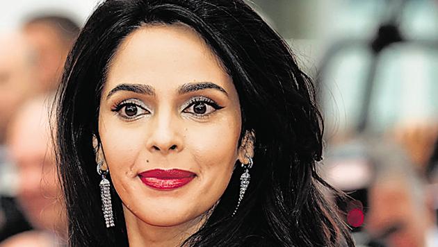 Mallika Sherawat poses as she arrives for the screening of Jimmy's Hall at the 67th edition of the Cannes Film Festival in Cannes, southern France, on May 22, 2014. (AFP) Mallika Sherawat poses as she arrives for the screening of Jimmy's Hall at the 67th edition of the Cannes Film Festival in Cannes, southern France, on May 22, 2014. (AFP)