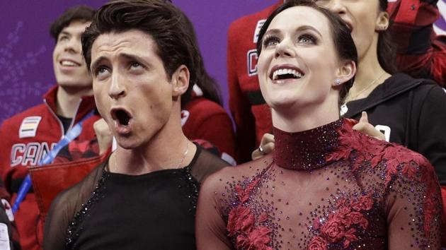 Scott Moir and Tessa Virtue of Canada during the figure skating team event at the Pyeongchang Winter Olympics on Monday. (AP) Scott Moir and Tessa Virtue of Canada during the figure skating team event at the Pyeongchang Winter Olympics on Monday. (AP)