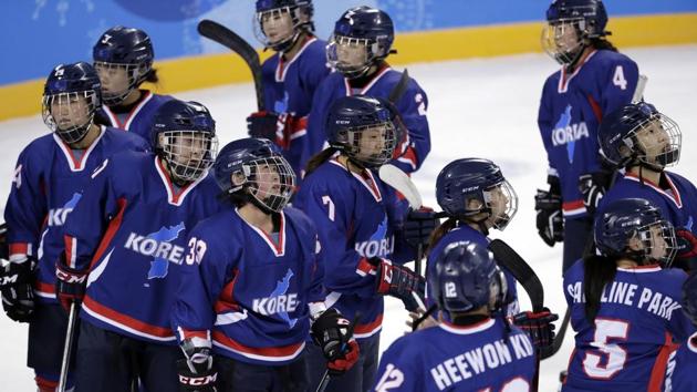 Players of the combined Koreas react after the preliminary round of the women's hockey game against Sweden at the 2018 Winter Olympics in Gangneung, South Korea, on Monday. Sweden won 8-0. (AP) Players of the combined Koreas react after the preliminary round of the women's hockey game against Sweden at the 2018 Winter Olympics in Gangneung, South Korea, on Monday. Sweden won 8-0. (AP)