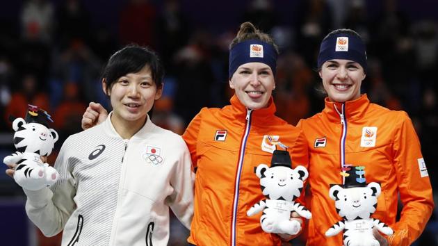 Silver medallist Miho Takagi of Japan, gold medallist Ireen Wust of Netherlands and bronze medallist Marrit Leenstra of The Netherlands pose for photographers after the women's 1,500 meters speedskating race at the Gangneung Oval at the 2018 Winter Olympics in Gangneung, South Korea, on Monday. (AP) Silver medallist Miho Takagi of Japan, gold medallist Ireen Wust of Netherlands and bronze medallist Marrit Leenstra of The Netherlands pose for photographers after the women's 1,500 meters speedskating race at the Gangneung Oval at the 2018 Winter Olympics in Gangneung, South Korea, on Monday. (AP)