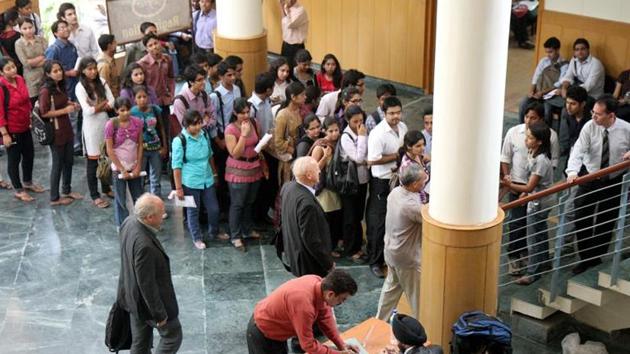 Delhi University students line up for placement interviews on the campus. The UGC has sought feedback on its draft regulations for appointing teachers and other academic staff in universities and colleges.(Amit Hasija/ HT Photo)