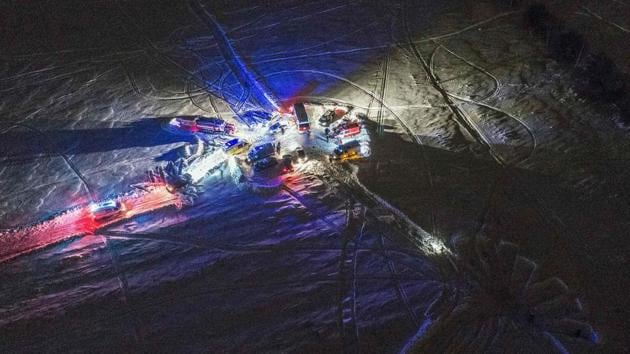 An aerial view shows Russian emergency vehicles arriving near the site of the crash, which was enveloped in heavy, waist-high snow making access difficult. The Saratov Airlines jet disappeared from radar screens a few minutes after departing Domodedovo airport. (Dmitry Serebryakov / AFP) An aerial view shows Russian emergency vehicles arriving near the site of the crash, which was enveloped in heavy, waist-high snow making access difficult. The Saratov Airlines jet disappeared from radar screens a few minutes after departing Domodedovo airport. (Dmitry Serebryakov / AFP)